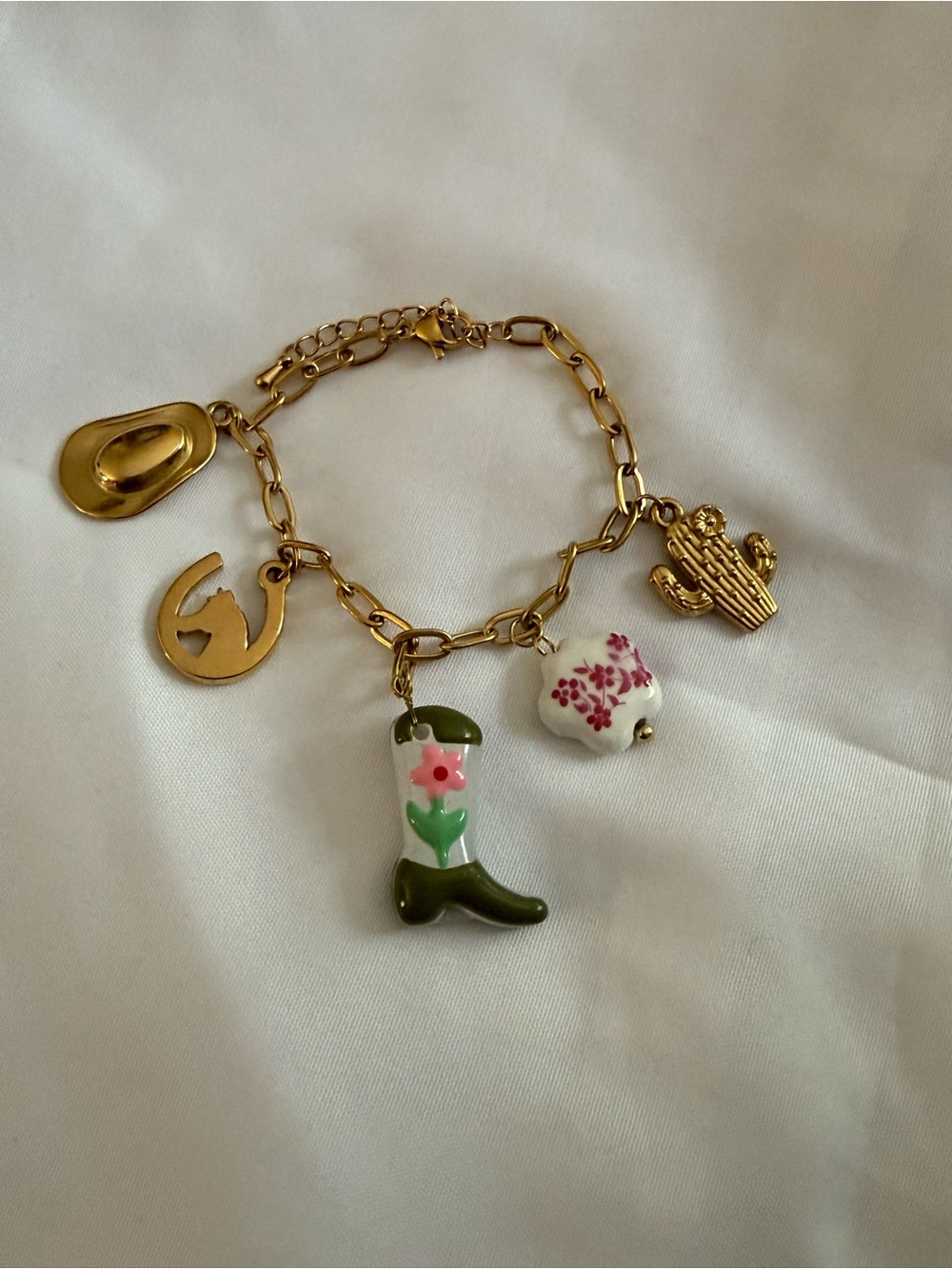 Gold-Tone stainless steel Western Charm Bracelet with Green Boot & Floral Charms